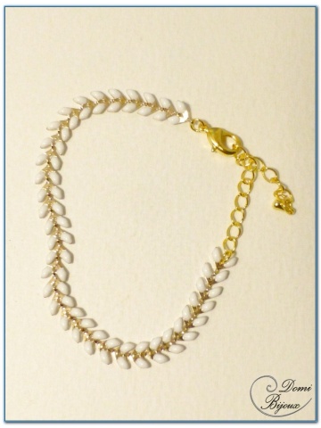 bracelet fantaisie finition doré motif epis émail blanc